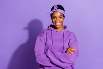 Photo of self-assured transgender folded arms wear headband sweatshirt isolated purple color background