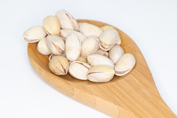 pistachios ready to eat on white background