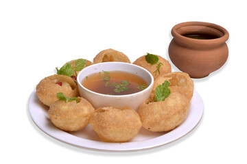 Delicious north and south indian street food pani puri gol gappa with tamarind water served in white plate and mud pot with potato and chickpeas with transparent background - obrazy, fototapety, plakaty