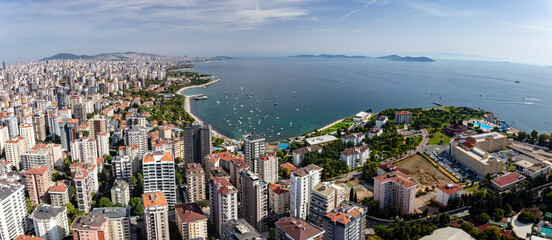 Aerial view of Fenerbahce and Caddebostan districts and the Princes' Islands on the Marmara Sea coast of the Asian side of Istanbul, Turkey.
