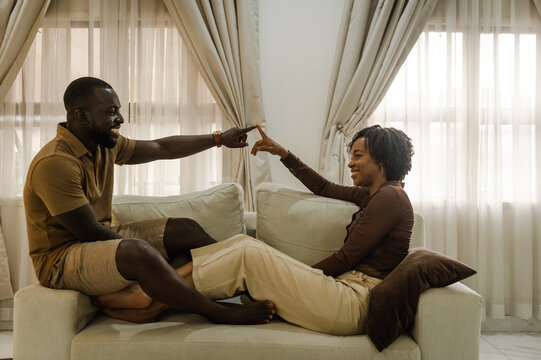 black couple playing with each other