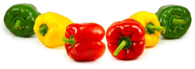 red,yellow and green pepper isolated on white background