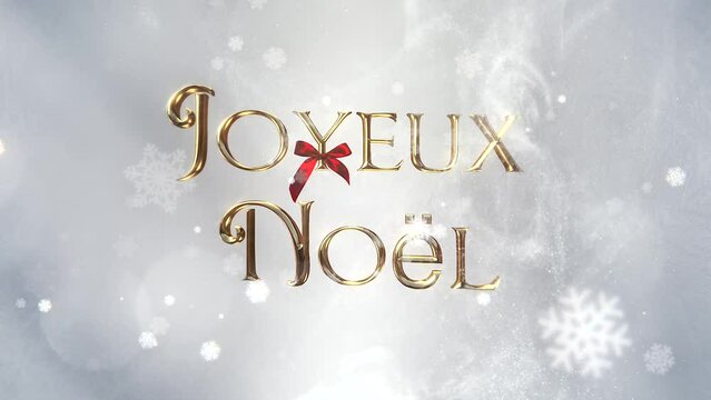 Joyeux noël - golden inscription with a flying red bow coming in circulation on a white background and falling snow