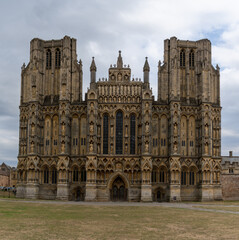 Fototapeta na wymiar view of the two spires and front of the 12th-centruy Gothic Wells Cathedral in Somerset
