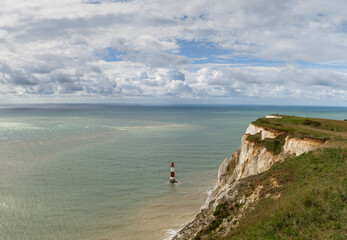 the Beachy Head Lighthouse in the English Channel and the white cliffs of the Jurassic Coast