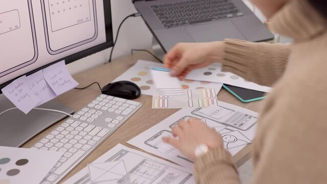 UX design, mobile app and woman hands planning user screen for software development, graphic design and digital decision. Creative, productivity and planner UI developer strategy on multimedia tech