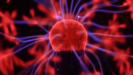 Electric plasma ball lamp. Tesla Coil experiment with electricity. Soft focus