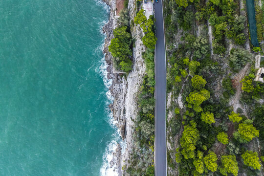 Aerial view of a road following the cliffs in Cetara, Amalfi Coast, Salerno, Campania, Italy.