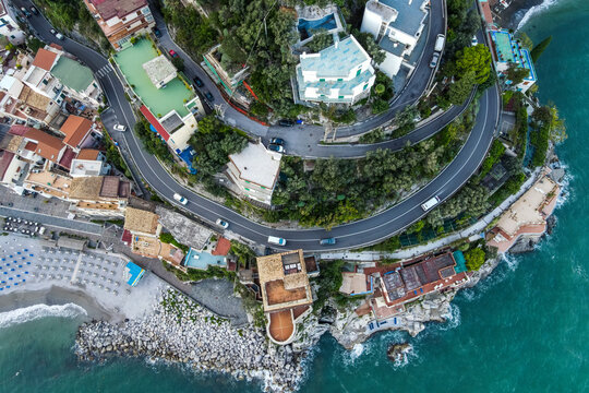 Aerial view of vehicles driving on the road in Cetaram Amalfi Coast, Salerno, Campania, Italy.