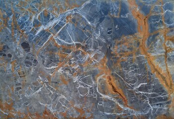 Natural blue grey marble material surface texture with rusty orange brown stone veins
