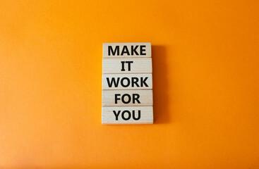 Make it work for you symbol. Business Concept words Make it work for you on wooden blocks. Beautiful orange background. Business and Make it work for you. concept. Copy space