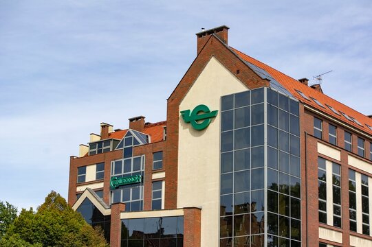 Abandoned Centromor offices in centre of Gdansk, Poland with a green logo of company