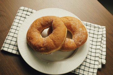 Freshly made donuts on the breakfast table - 541787688