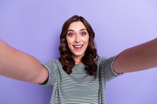 Photo of excited joyful cute lady make video content instagram facebook post give feedbak followers isolated on purple color background