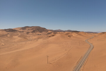 Aerial view of mountains and a road in the atacama desert near the city of Copiapó, Chile