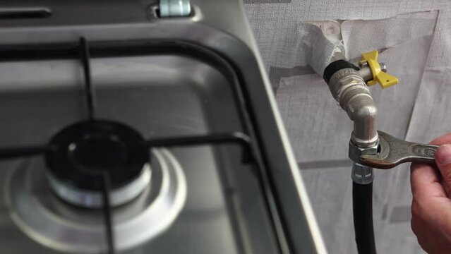 Turn off gas stove for repairs, shutting off shut off valve and unscrew nut on flexible gas pipeline with wrench.