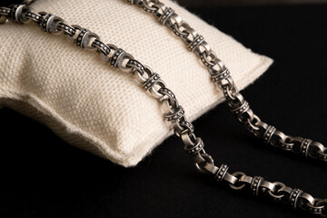 Fototapeta na wymiar Sterling silver brutal necklace as jewelry accessories for brutal biker