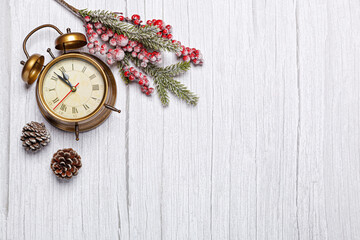vintage christmas clock on wooden background