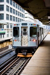 The elevated commuter train prepares to leave the  station in Chicago, Illinois.