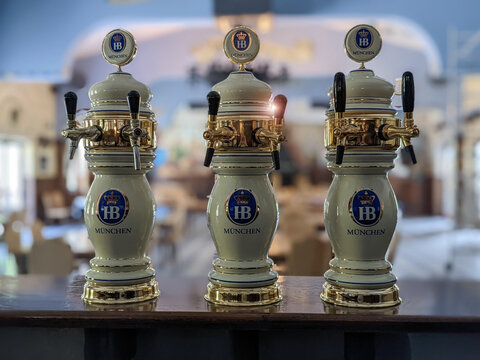 Rikoti, Georgia, May, 27, 2022: Hofbrau beer pumps or taps inside a restaurant, selective focus