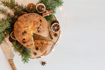 Panettone, traditional italian Christmas sweets for winter holidays celebration. Cristmas desert, festive dinner concept - obrazy, fototapety, plakaty