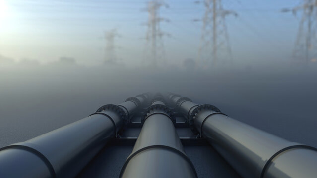 Pipelines and high voltage transmission towers in the morning fog