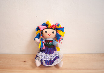 mexican indigenous lele doll on white background