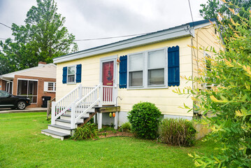 Small cute mobile house. View of the lawn porch.