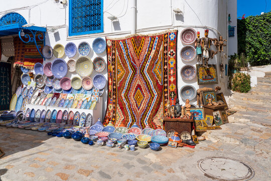 Traditional pottery and carpets on sale in Sidi Bou Said village near Carthage and Tunis, Tunisia