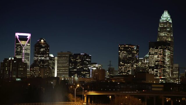 Lockdown Shot Of Illuminated Modern Buildings In Downtown Against Clear Sky At Night - Charlotte, North Carolina