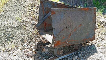 Fototapeta na wymiar A vintage ore car - rusted and discarded