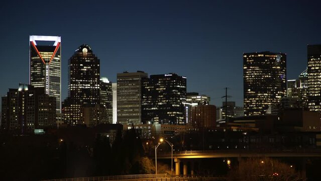 Lockdown Shot Of Illuminated Modern Buildings Against Clear Sky - Charlotte, North Carolina