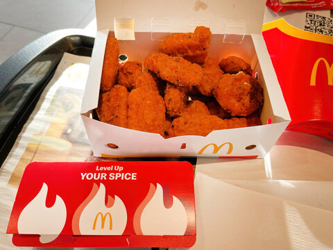 GERMANY - OCT 19, 2022: 20 Spicy Chicken McNuggets In A Box With Spicy Dip