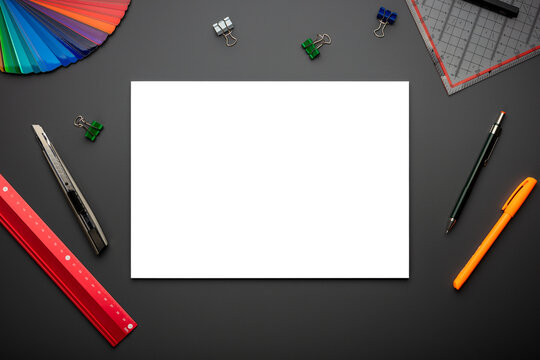 Empty or blank page in top view on creative desk or workplace as mockup or template showing creativity in school or at work 