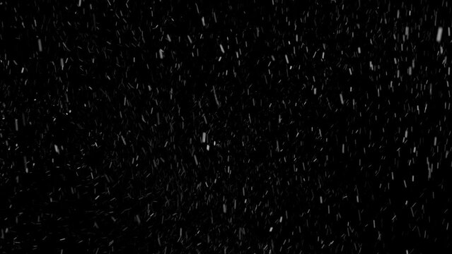 Slow Motion Winter real snowfall effect Snow storm isolated black background in 4K to be used for composing motion graphics overlay animation 4K drag and drop editing software supporting blending mode