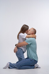 Fototapeta premium Happy smiling couple in love. Over white background. 