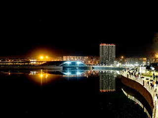 Foto op Plexiglas night bank of the Miass River in the city of Chelyabinsk © petrovval