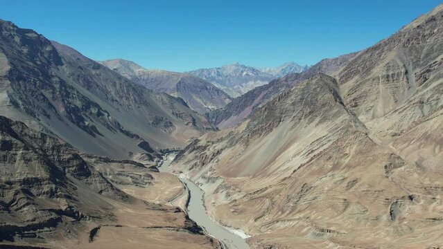 Aerial view of Sangam &ndash; the confluence of the Indus river (green colour) and the Zanskar river (blue or brown colour depending on the season) in Ladakh, India. 