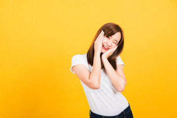 Asian happy portrait beautiful cute young woman teen stand surprised excited celebrating open mouth...