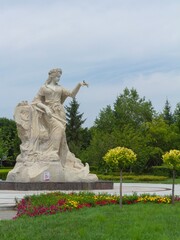 Fototapeta na wymiar Mudanjiang, Heilongjiang, China - June 21 2021: A female architecture statue. 
