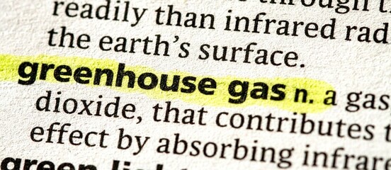 Close up photo of the words greenhouse gas in a dictionary book