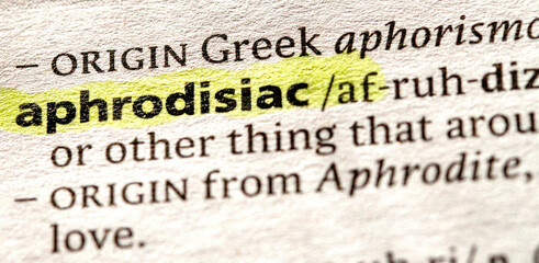 Close up photo o the word aphrodisiac in a dictionary book - obrazy, fototapety, plakaty