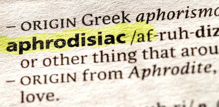 Close up photo o the word aphrodisiac in a dictionary book