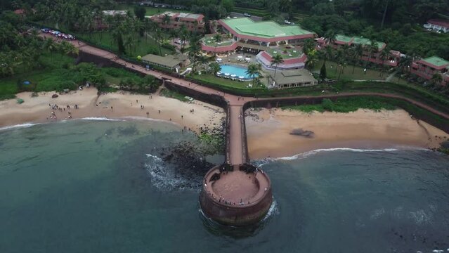 Goa, India 19th October 2022: 4k Drone shots Fort Aguada in North Goa - Seventeenth-century Portuguese fort standing on Sinquerim Beach. Popular also Watersports activities and white sand beach.  