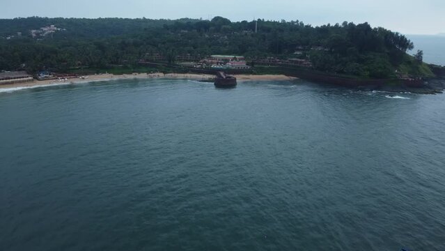 Goa, India 19th October 2022: 4k Drone shots Fort Aguada in North Goa - Seventeenth-century Portuguese fort standing on Sinquerim Beach. Popular also Watersports activities and white sand beach.  