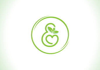 Love healthy and green nutrition leaf logo design with the letters. Green love leaf logo