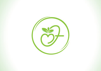 Love healthy and green nutrition leaf logo design with the letters. Green love leaf logo
