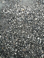 texture Small construction stone, gray, damp