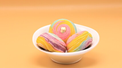 Snacks in the shape of a circle, put in a white plate.