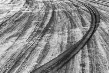 Background with tire marks on road track, Car track asphalt pavement background at the circuit,...